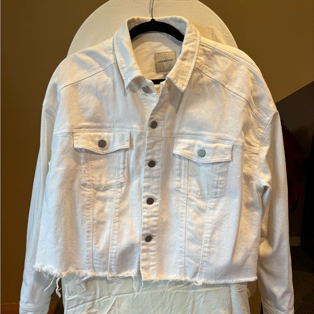 Distressed white denim jacket